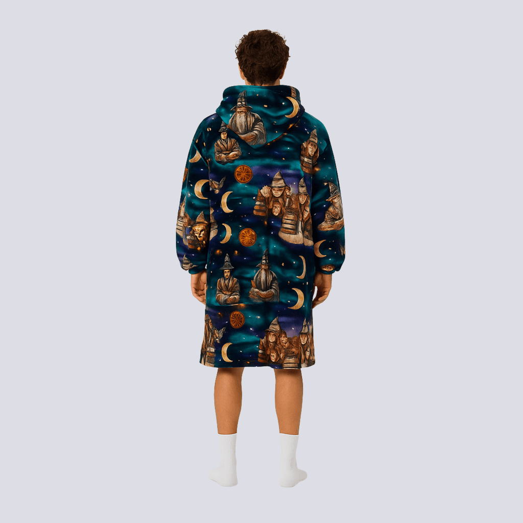 Back view of Wise Wizard Warrior hoodie blanket featuring full wizard-themed pattern in deep midnight blue tones.